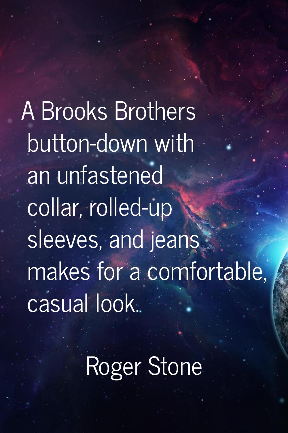 A Brooks Brothers button-down with an unfastened collar, rolled-up sleeves, and jeans makes for a c
