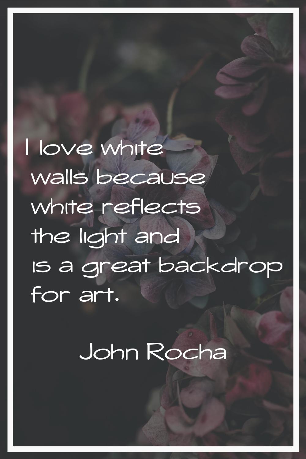 I love white walls because white reflects the light and is a great backdrop for art.