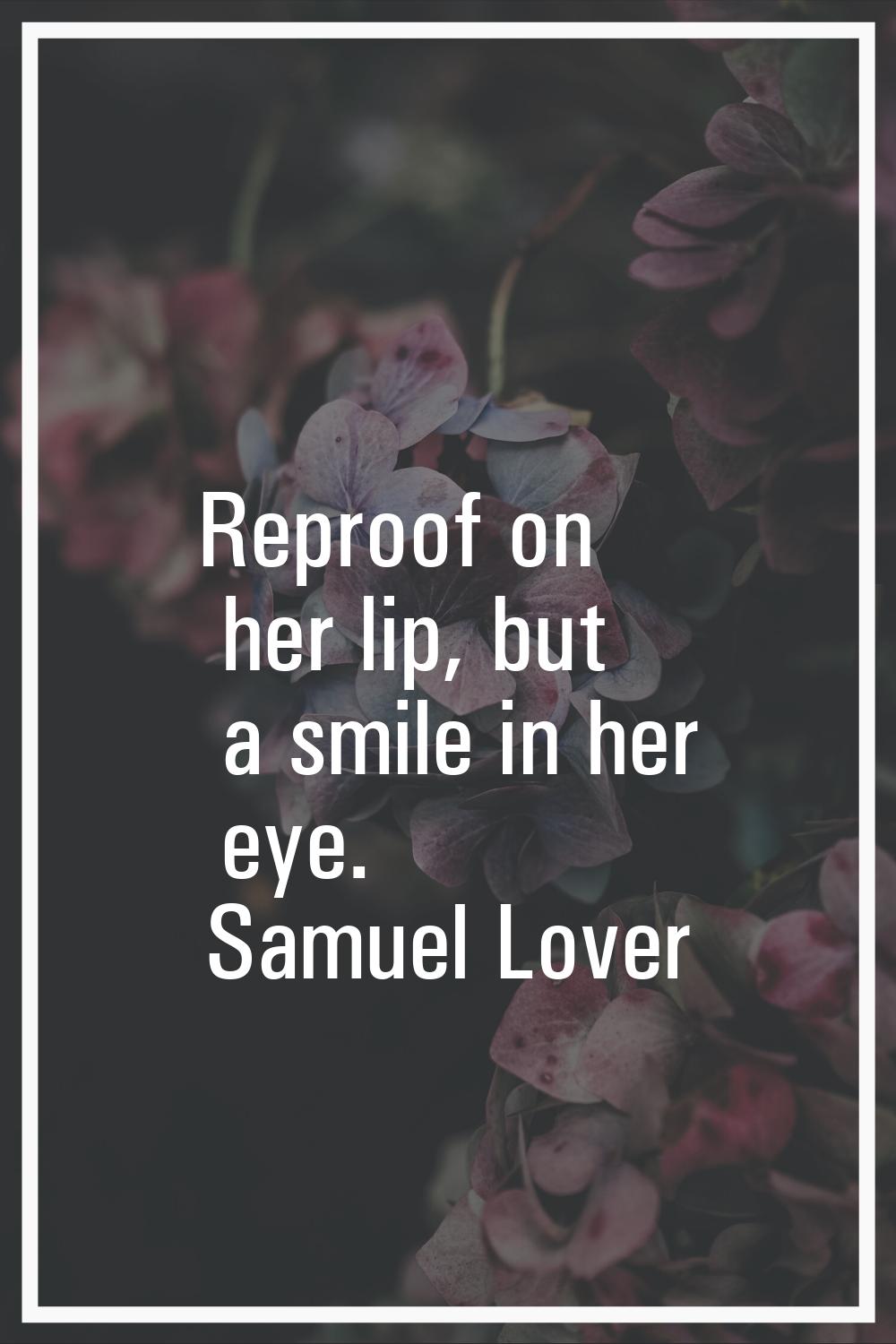 Reproof on her lip, but a smile in her eye.