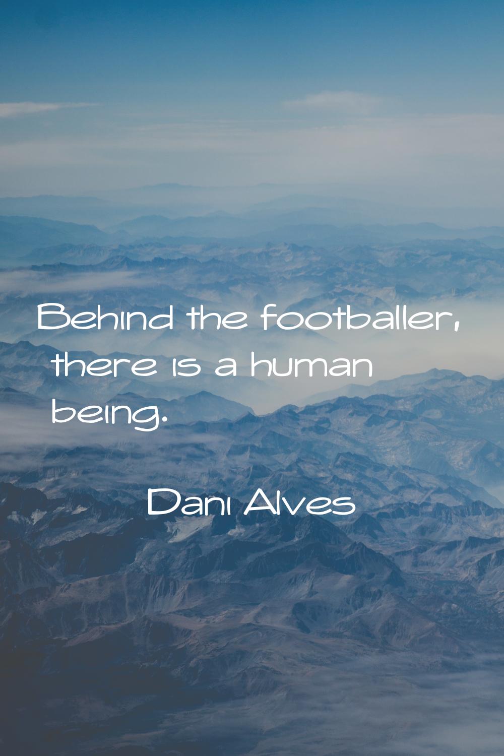 Behind the footballer, there is a human being.
