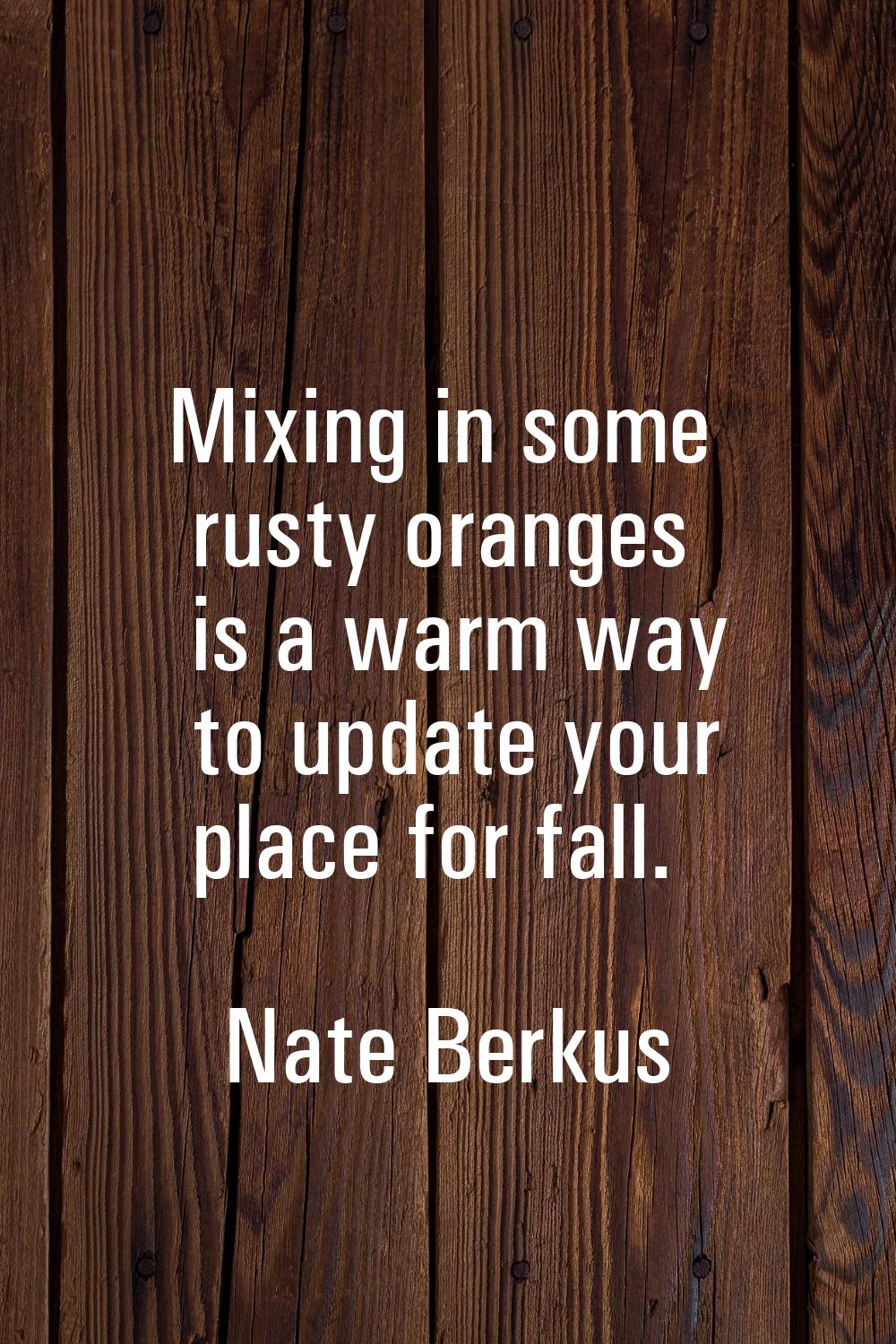 Mixing in some rusty oranges is a warm way to update your place for fall.