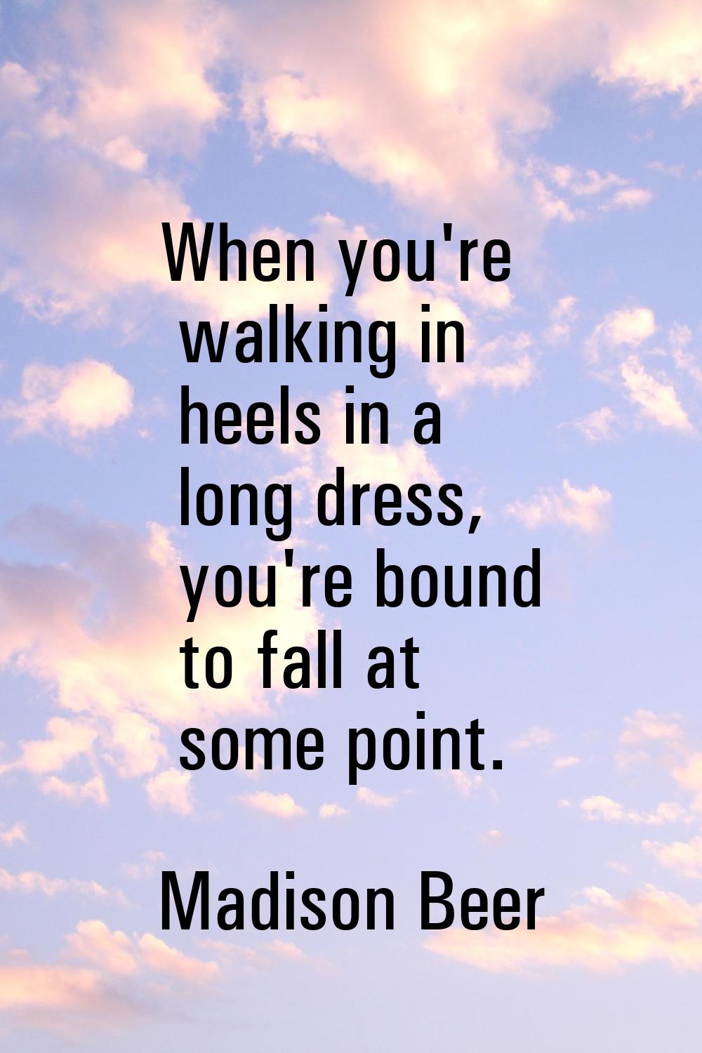 When you're walking in heels in a long dress, you're bound to fall at some point.